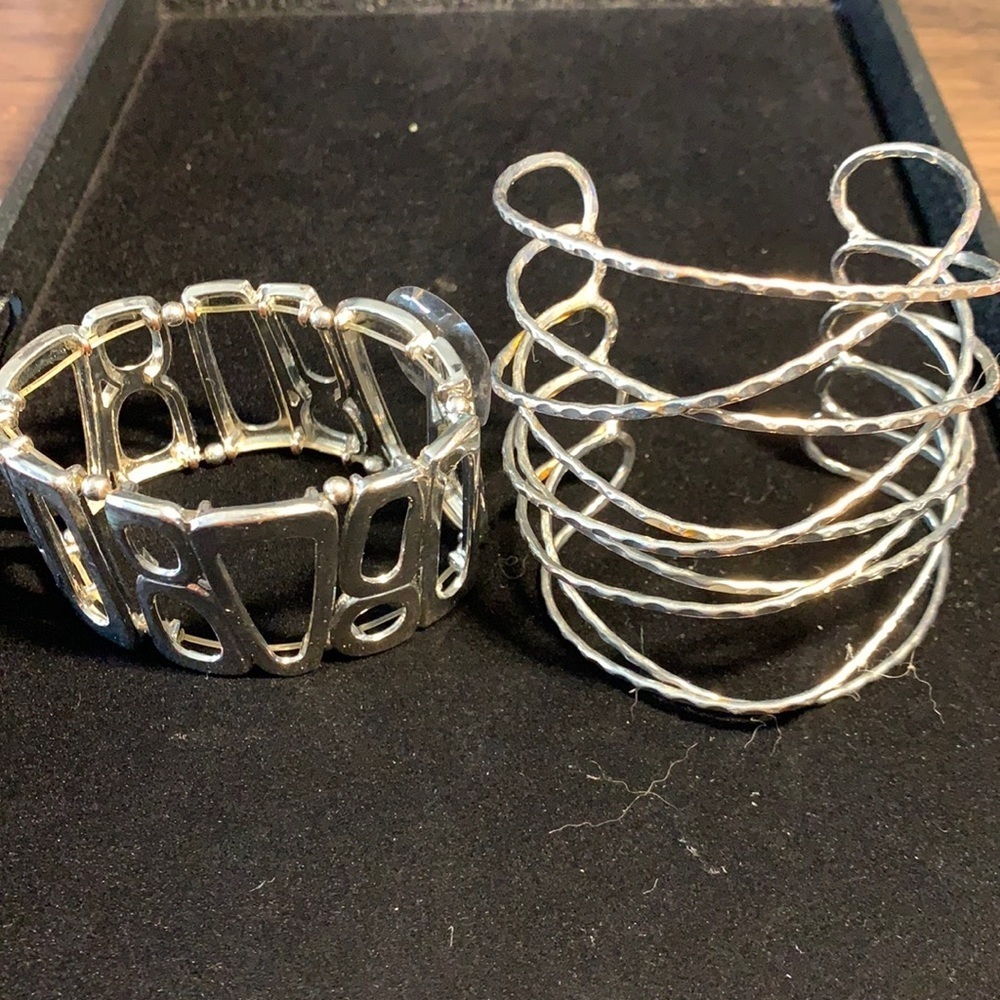 3/$12. Two large silver bracelets